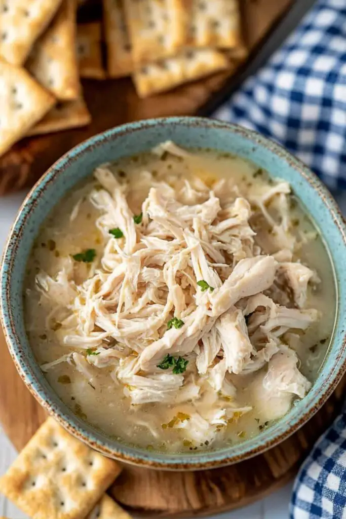 chicken mull accompanied by a garaham crackers