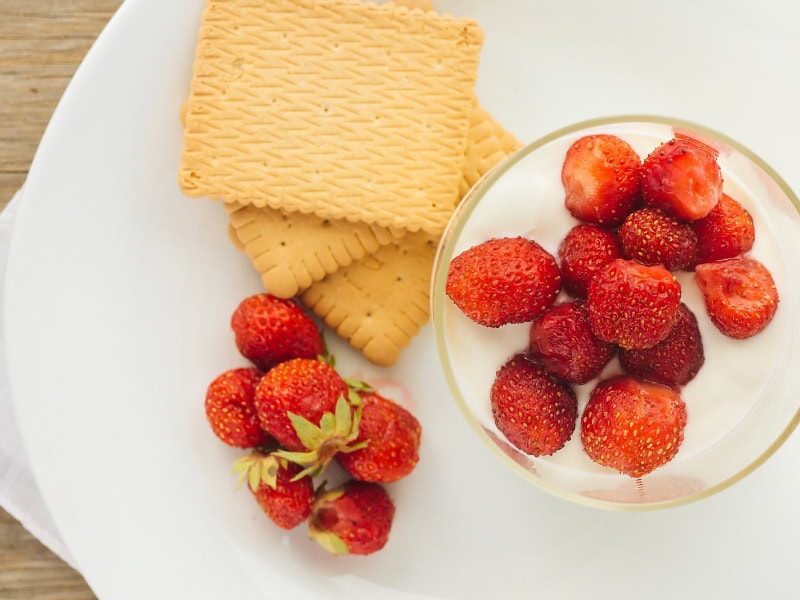 strawberries in bowl and crackers