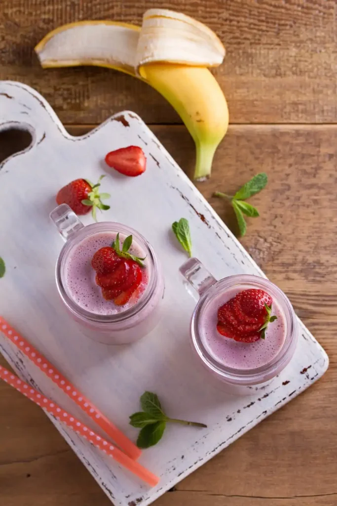 Strawberry banana milkshake in glass 