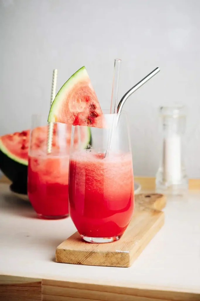 Two glasses of refreshing Watermelon Agua Fresca with drinking straws