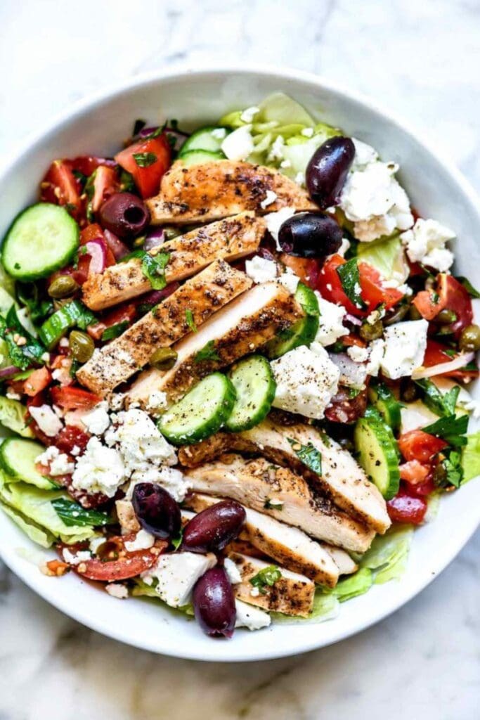 bowl filled with fresh  vegetables and chicken