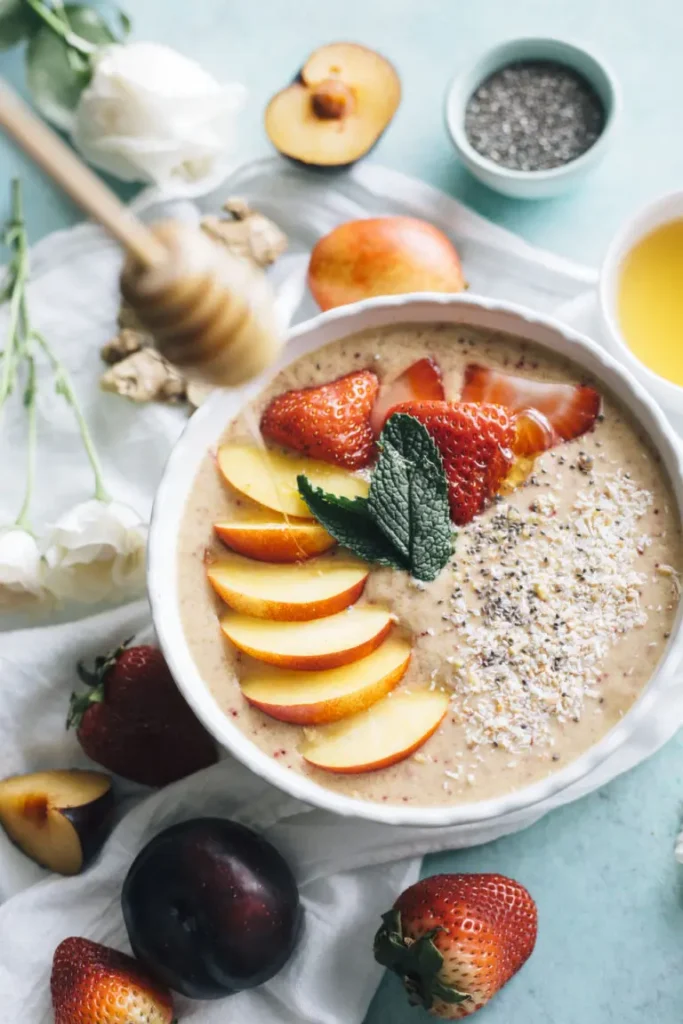 Nectarine Ginger Smoothie Bowl with strawberry decoration