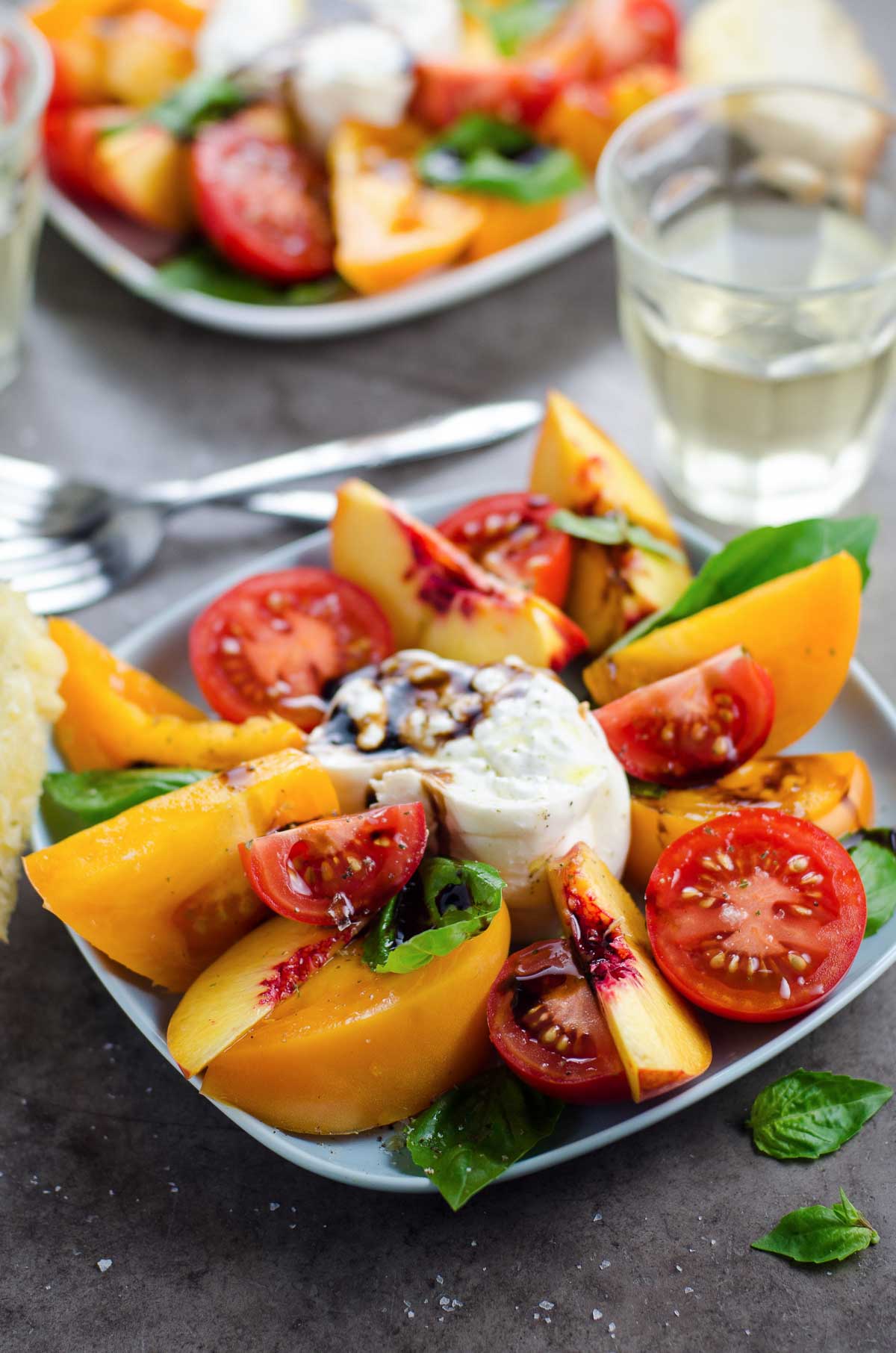 Tomato Nectarine Burrata Salad in plate