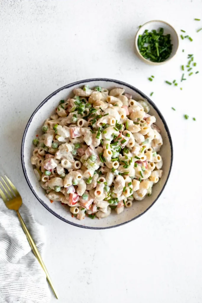 vegan macaroni salad in bowl with fork