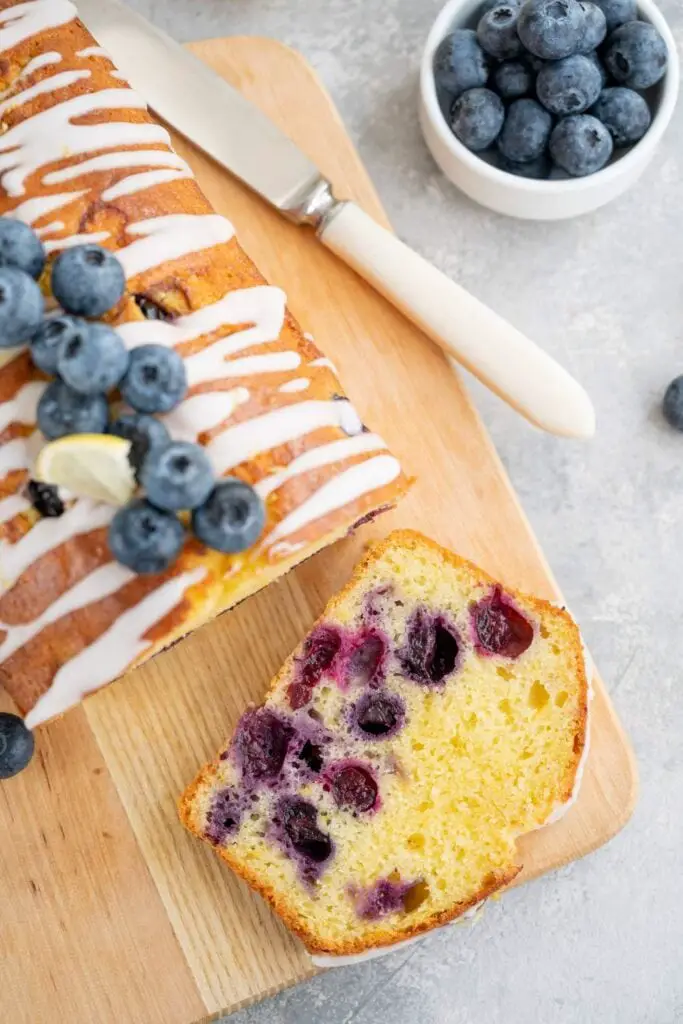 lemon blueberry pound cake with glaze and blueberries