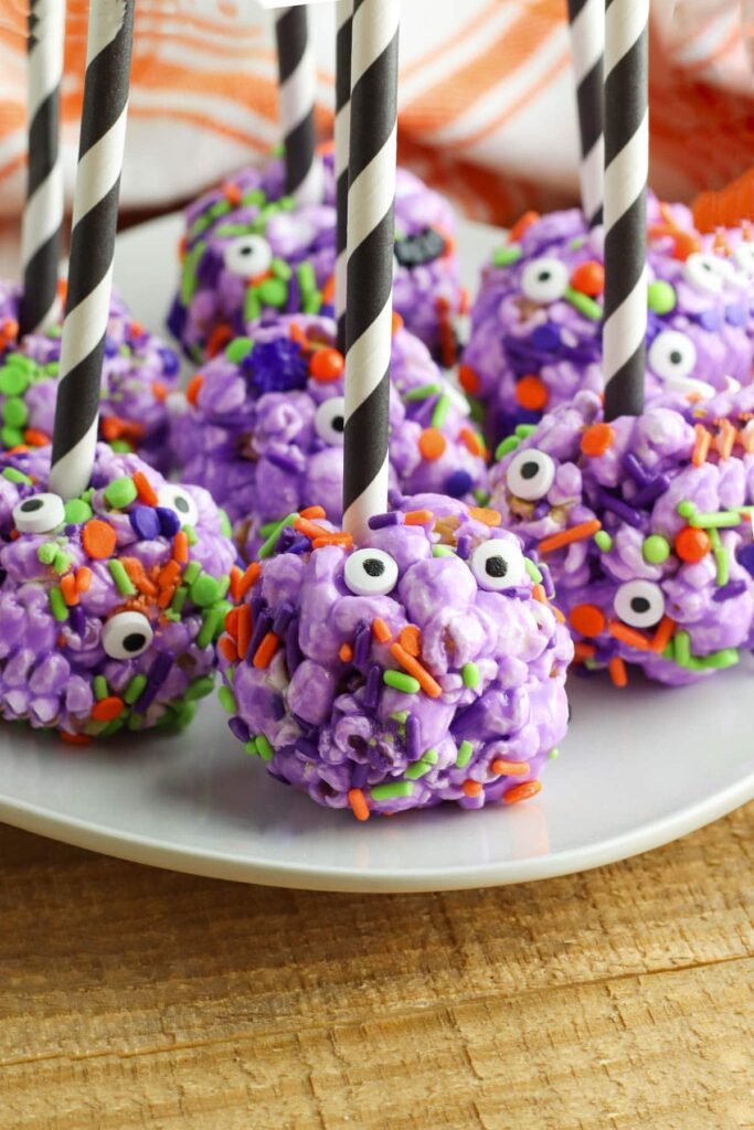 Halloween Popcorn Balls with paper straws