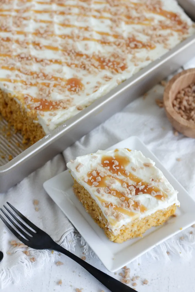 piece of pumpkin poke cake in plate