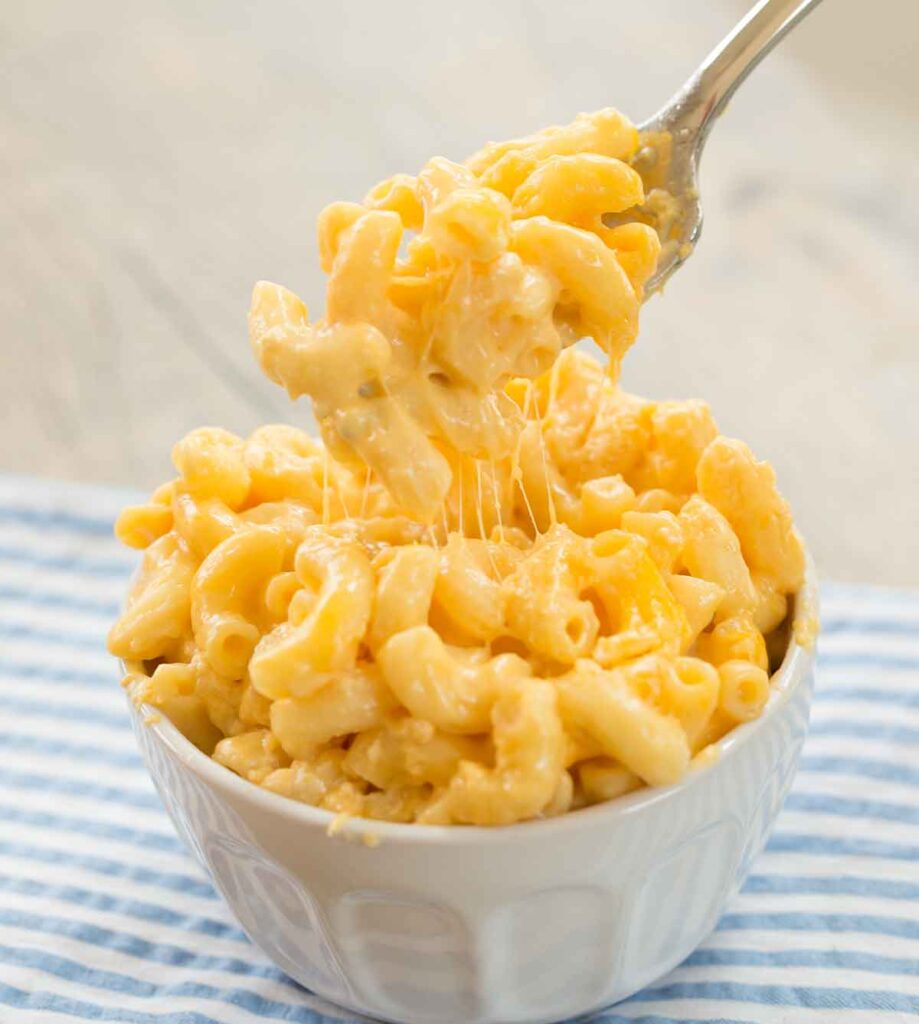 Crock Pot Mac and Cheese with spoon