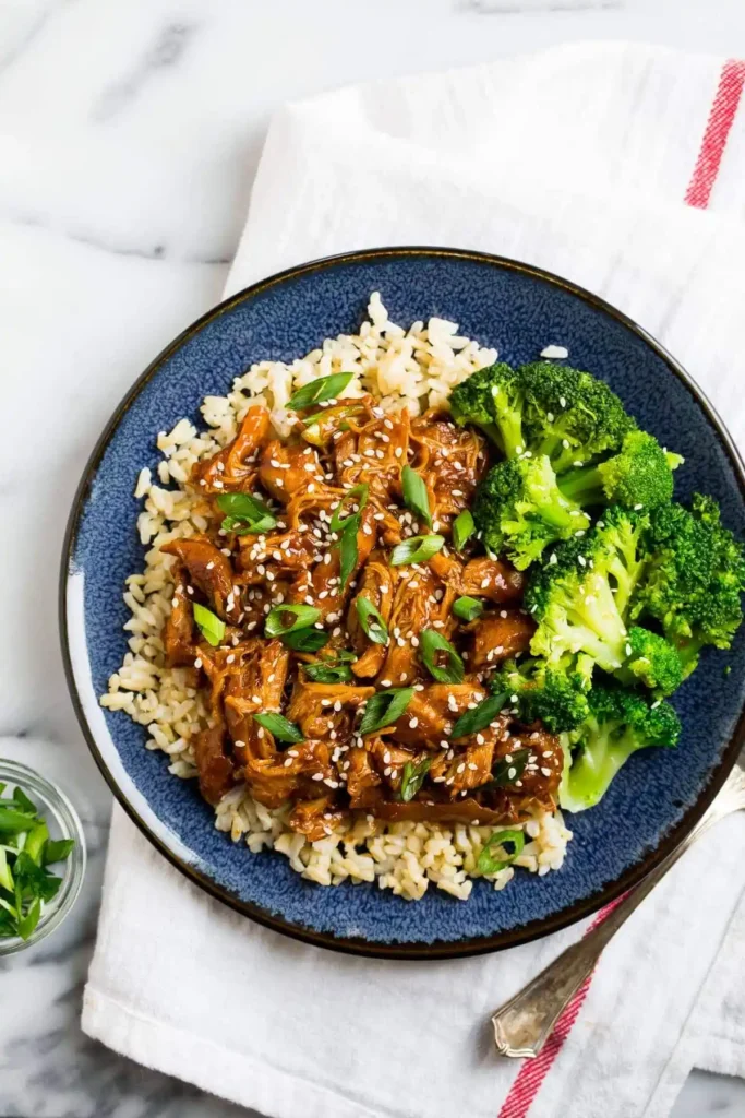 Crockpot Honey Garlic Chicken in blue plate