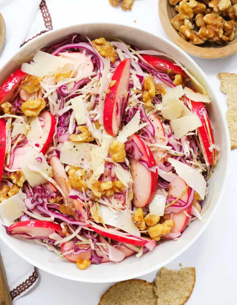 Crunchy Winter Salad with Fennel and Pomegranate in white bowl