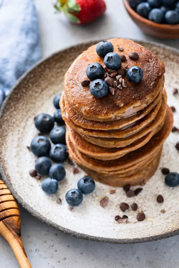 3-Ingredient Almond Flour Pancakes (No Banana) topped with blueberries