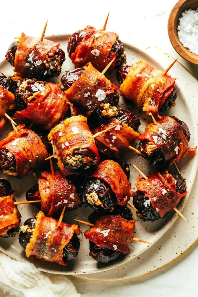 Bacon-Wrapped Dates in white plate