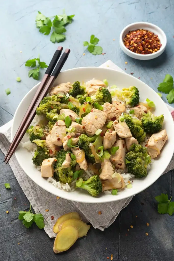 5-ingredient chicken and broccoli recipe in white plate with fork