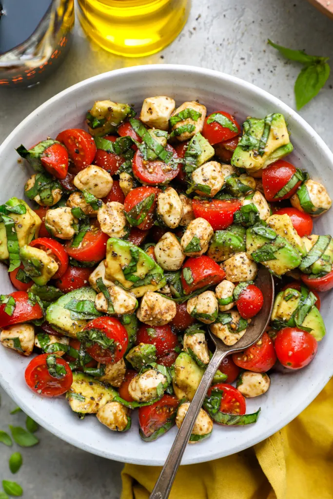 Avocado Caprese Salad in white plate