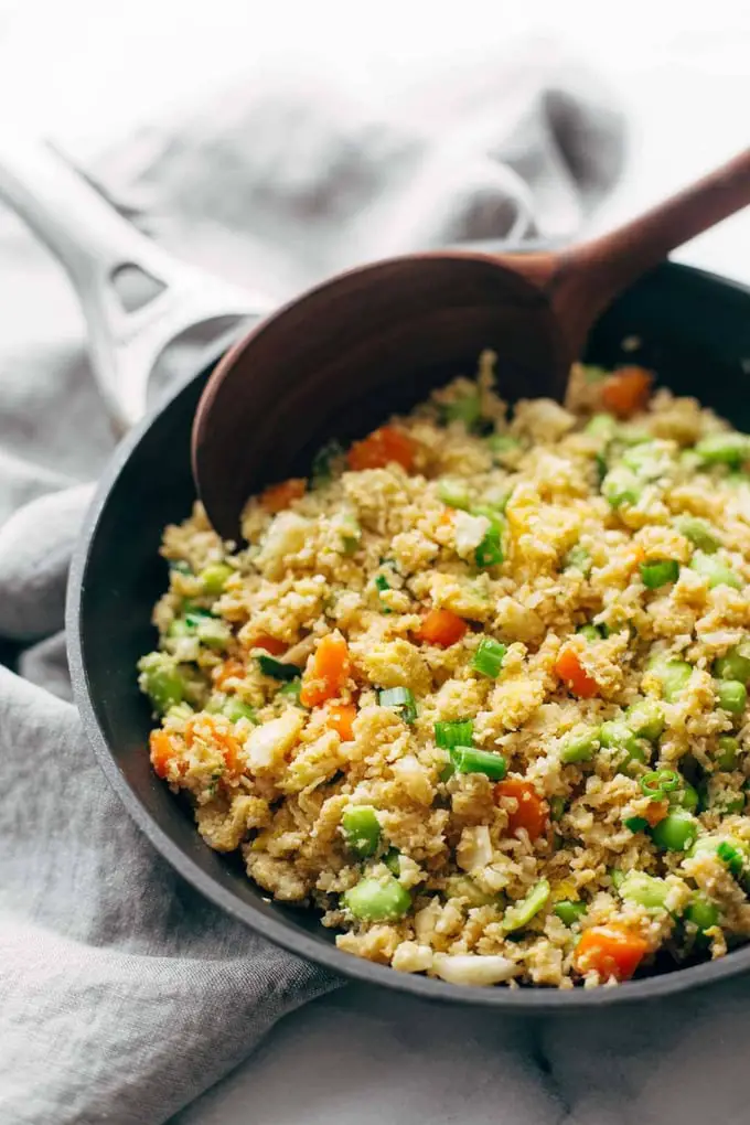 Cauliflower Fried Rice in black non stick pan