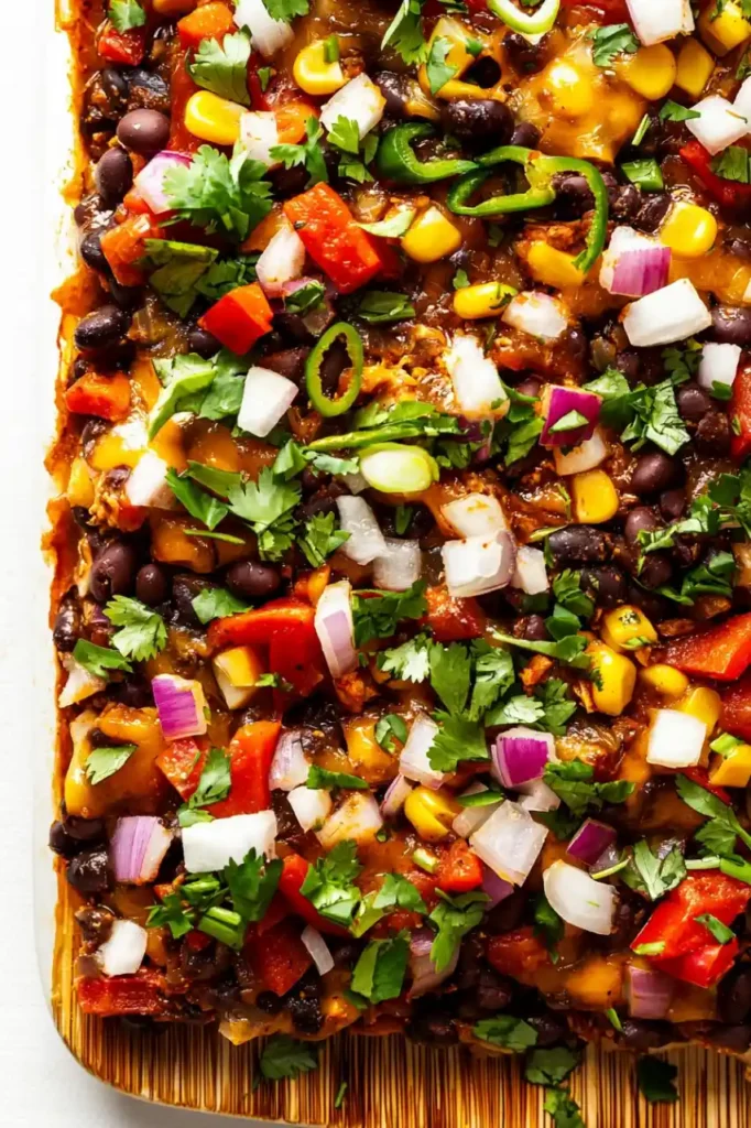 close view of Mexican Enchilada Casserole recipe with black beans