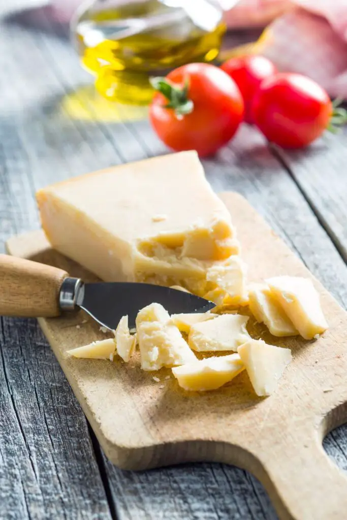 Parmesan Cheese on wooden table