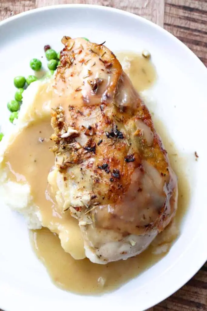 Bone-in Chicken Breast with Garlic Compound Butter Sauce