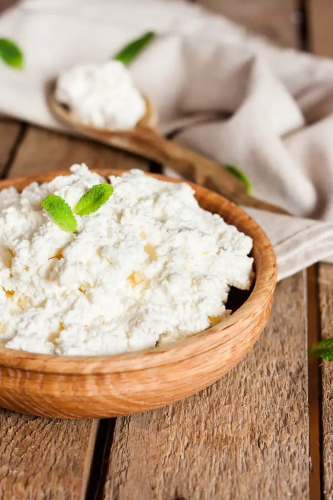 frozen cream cheese in wooden bowl