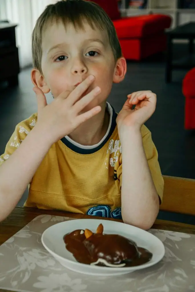 toddler eating junk food