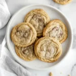 Chocolate Chipless Cookies in white plate beside white napkin is placed