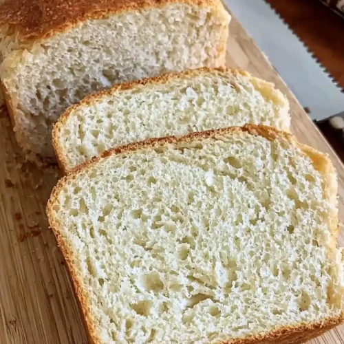 slices of cpttage bread place on wooden table