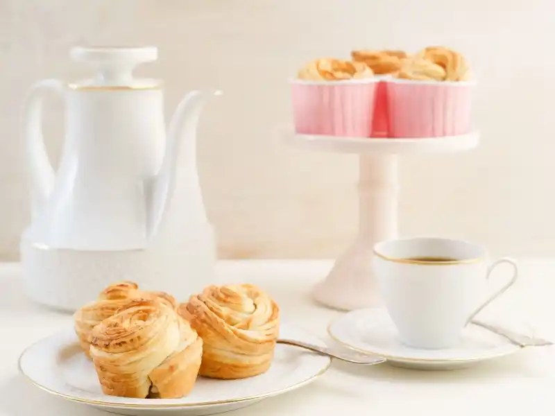 Apple Butter Cruffins in plate with tea