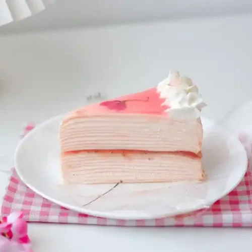 Strawberry Vanilla Marble Cake in white plate on table