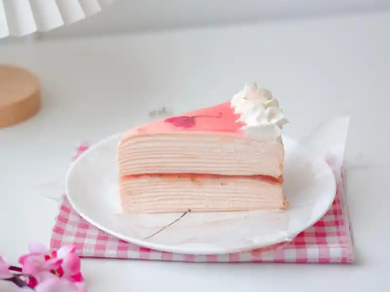 Strawberry Vanilla Marble Cake in white plate on table