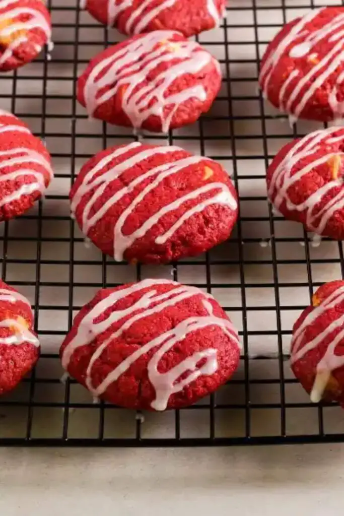 red color cookies decorated with cream
