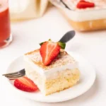Strawberry milk cake in plate with fork
