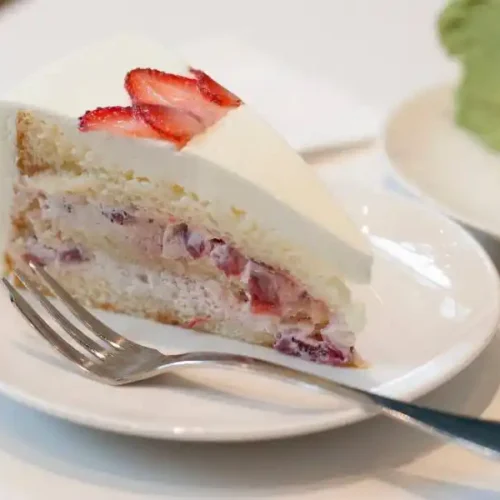 eggless strawberry shortcake in plate with fork