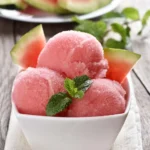 watermelon sorbet in bowl with mint