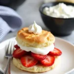 close view of one shortcake in plate with fork