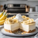 No Bake Banana Pudding Cheesecake in plate with vanilla and banana decoration
