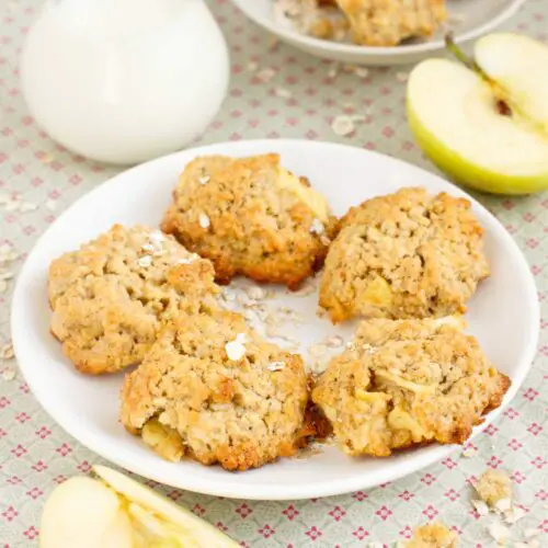 Spiced Apple Oatmeal Cookies in plate with jar of milk