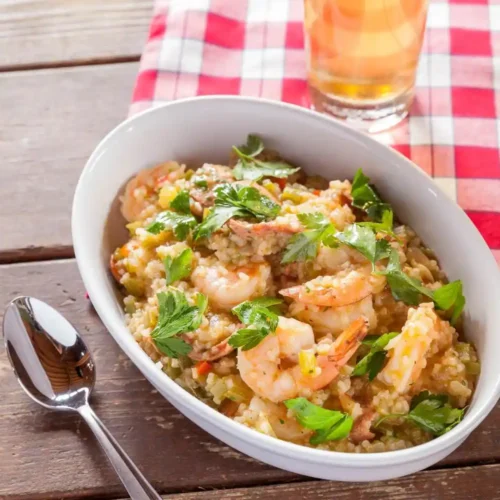 Shrimp Casserole with Ritz Crackers in dish with spoon