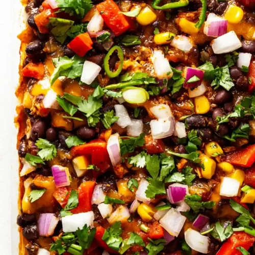 close view of Mexican Enchilada Casserole recipe with black beans