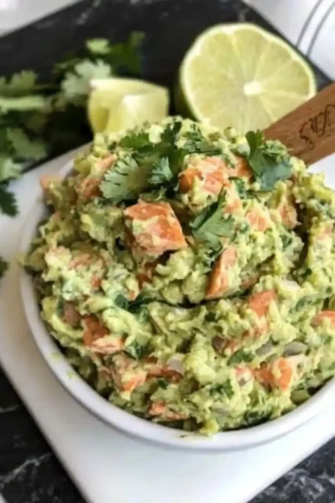 salmon guacamole in white bowl