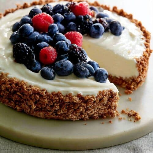 Far view of Frozen Yogurt Pie With Granola Crust with toppings