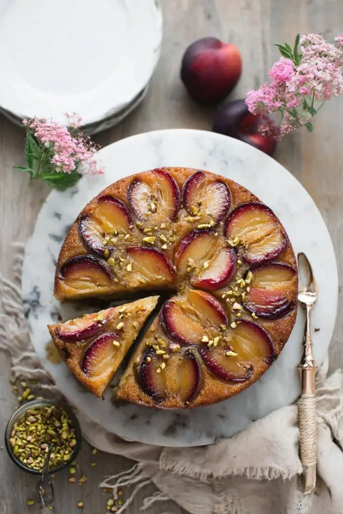 upper view of Plum Nectarine Pistachio Upside Down Cake