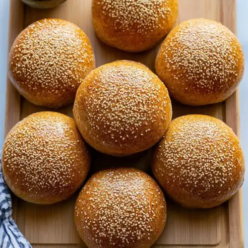 Honey Whole Wheat Hamburger Buns  putted in a wooden tray